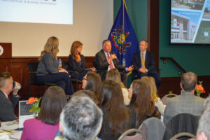 executive speaker panel kim thomas, jennie hagerty, tim necastro, and boo hagerty discussing housing