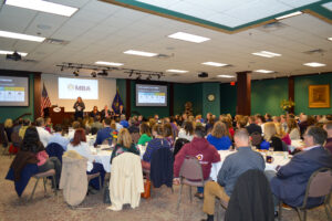 executive speaker series kim thomas speaking to panel of jennie hagerty, tim necastro, and boo hagerty.