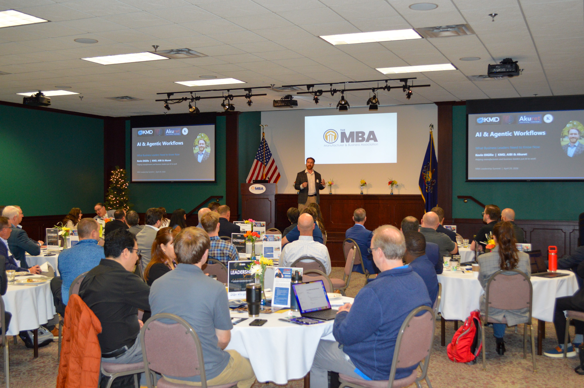 An image of Leadership Summit speaker Kevin DiGilio speaking on AI
